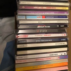 Various CDs including Adele, Miley Cyrus